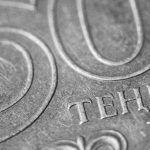 a close up of a fifty cent coin